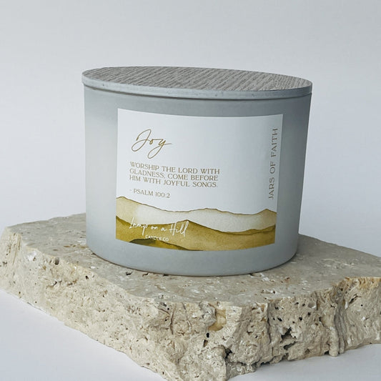 JOY - Jars of Faith Candle Jar. TROPICAL GARDENIA scented. “Worship the Lord with gladness; come before him with joyful songs.” Psalm 100:2